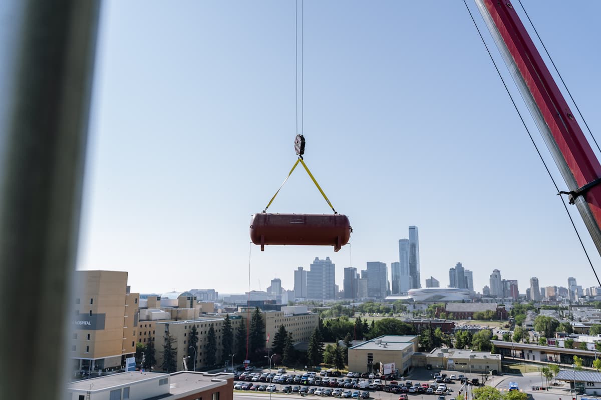 Construction supplies being lifted over canada